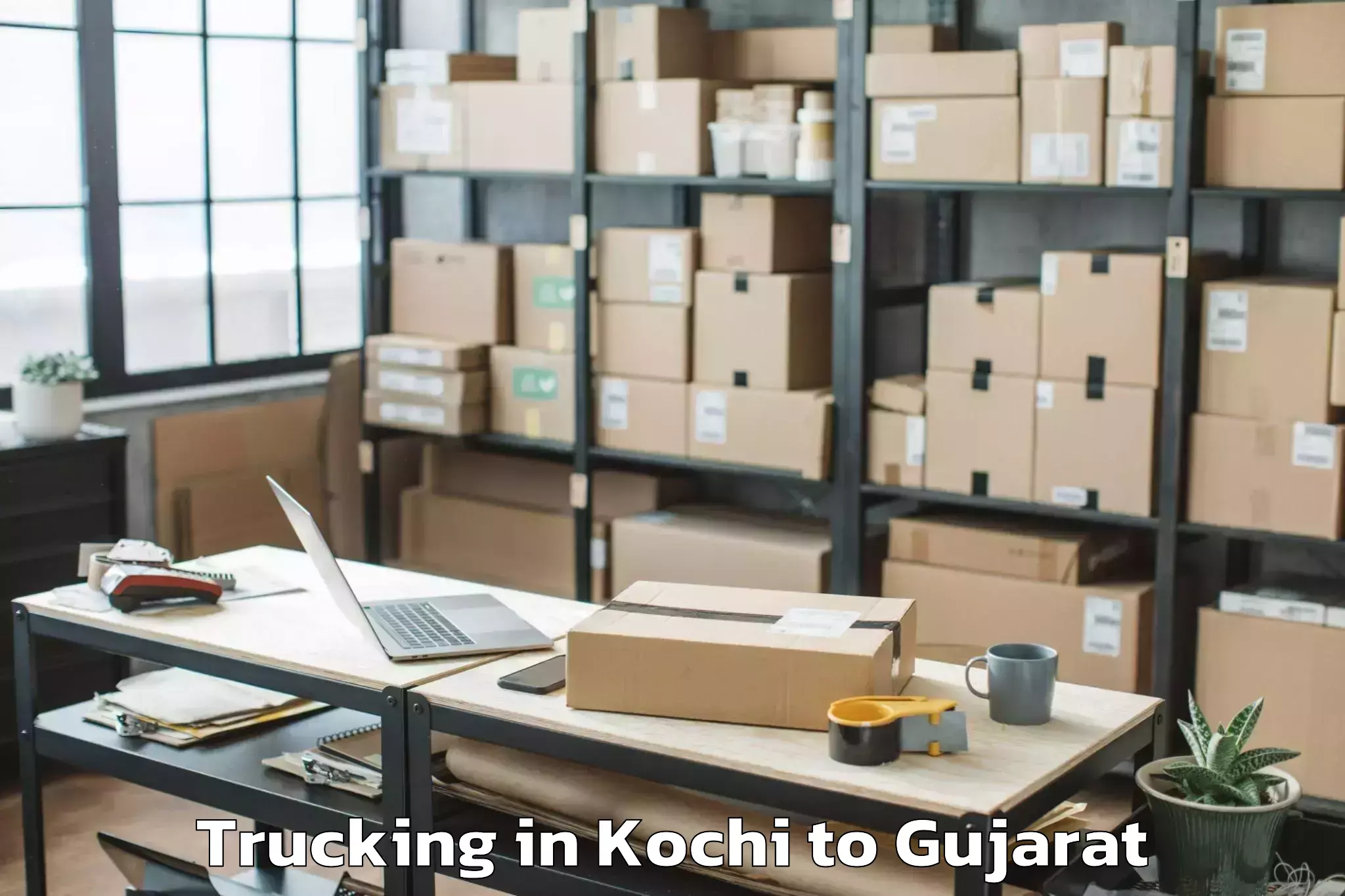 Reliable Kochi to Khambhalia Trucking